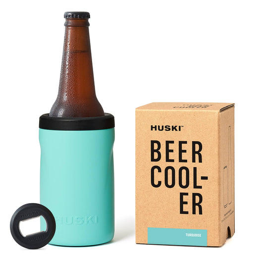 Huski beer cooler with bottle and box on a white background